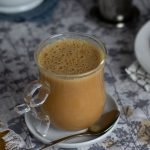 teh tarik in a glass, milky tea