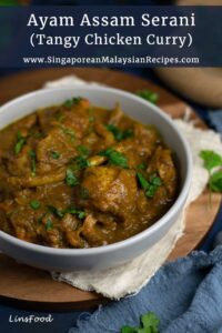 Ayam Assam Serani in a white bowl