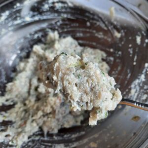 prawn ball paste all mixed in a glass bowl