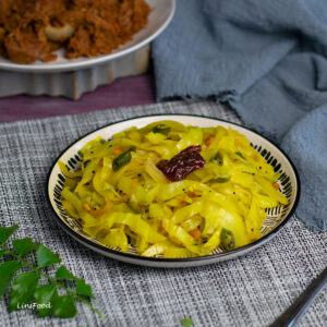 yellow coloured stir-fried cabbage on a plate