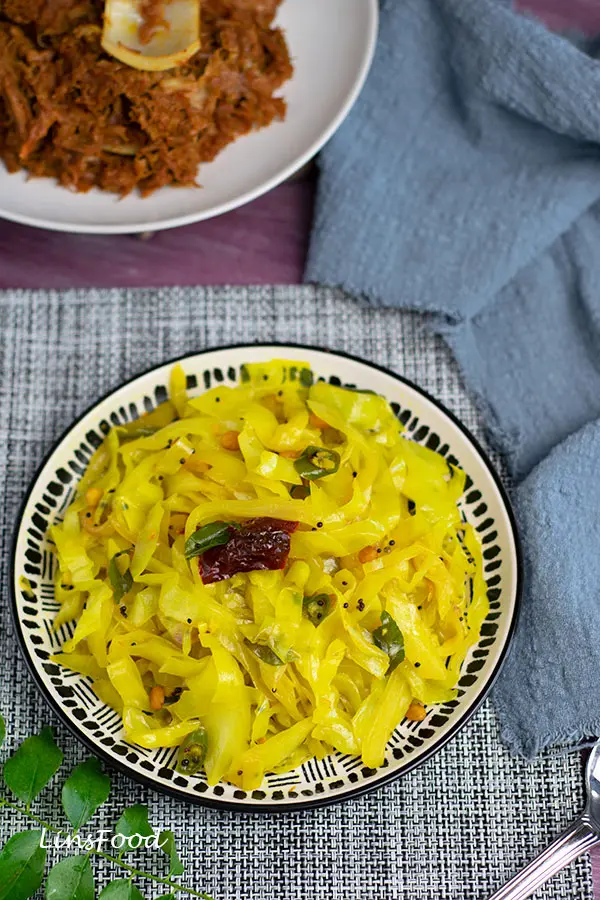 yellow coloured stir-fried cabbage on a plate