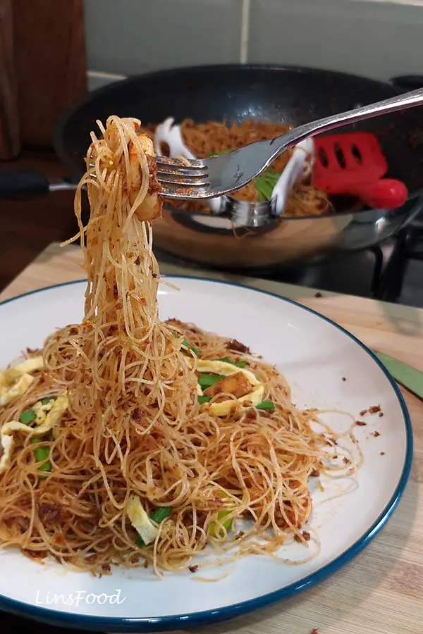 fried vermicelli noodles on a fork