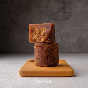 blocks of gula melaka on a wooden board