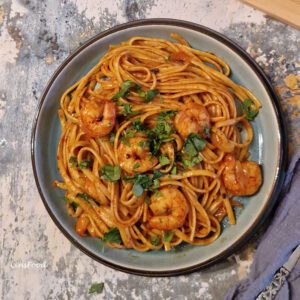 Sambal prawn pasta tossed in a spicy Malaysian sambal butter sauce with linguine and fresh herbs.