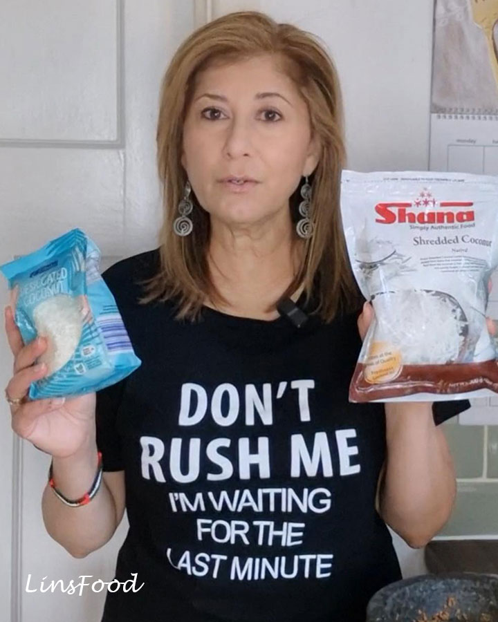 Packets of desiccated coconut and frozen shredded coconut held up side by side, with their labels facing the camera.